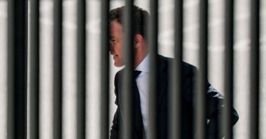 NATO Secretary-General Mark Rutte walks into the White House, as seen through a fence, in Washington, D.C., U.S., April 8, 2026. (Reuters Photo)