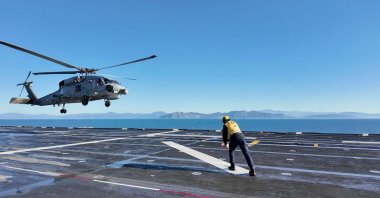 In this undisclosed location due to security concerns, a helicopter participates in the Blue Homeland-2026 exercise, April 6, 2026. (AA Photo)