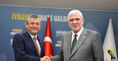 CHP Chair Özgür Özel (L) visits Good Party (IP) head Müsavat Dervişoğlu (R) at the IP's headquarters to discuss by-election debates, Ankara, Türkiye,  April 9, 2026. (AA Photo)