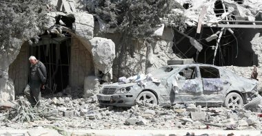 A man checks the site of an Israeli airstrike that targeted a religious Shiite complex the day before in Sidon, southern Lebanon, April 9, 2026. (AFP Photo)