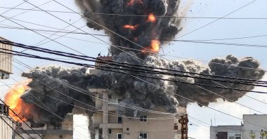A fireball rises from a building hit by an Israeli airstrike in the area of Abbasiyeh, on the outskirts of the southern Lebanese city of Tyre, April 8, 2026. (AFP Photo)