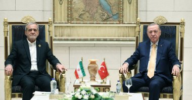 President Recep Tayyip Erdoğan meets with Iranian President Masoud Pezeshkian on the sidelines of D-8 summit in Cairo, Egypt, Dec. 19, 2024. (Turkish Presidential Press Office/Handout)