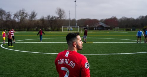 Tehran native and Stony Brook University graduate student Arad Ershad plays football with friends at Stony Brook University, Stony Brook, U.S., April 3, 2026. (AP Photo)