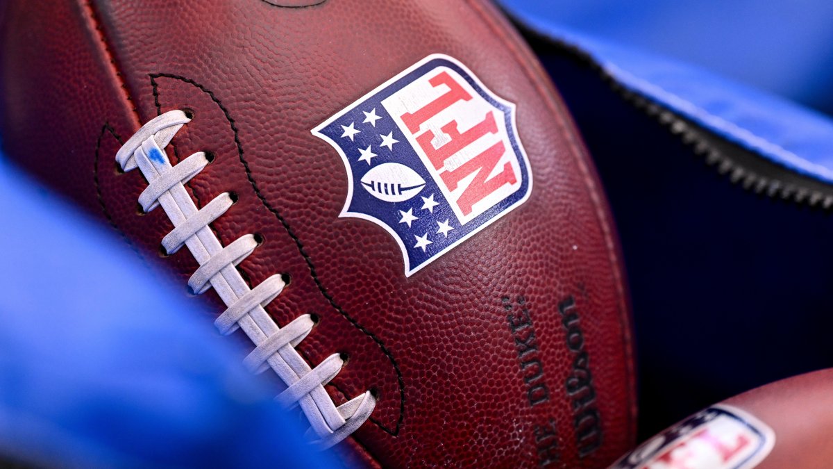 A detail view of the NFL shield on a football prior to an NFL football game between the Houston Texans and the Indianapolis Colts, Houston, U.S., Jan. 4, 2026. (AP Photo)