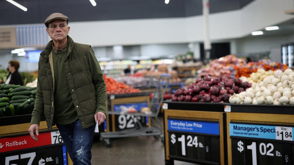 A customer looks over produce at a Walmart Supercenter retail store in North Bergen, New Jersey, U.S., Nov. 21, 2025. (Reuters Photo)