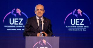 Treasury and Finance Minister Mehmet Şimşek speaks at the International Economy Summit in the Sapanca district of Sakarya province, northwestern Türkiye, April 10, 2026. (AA Photo)
