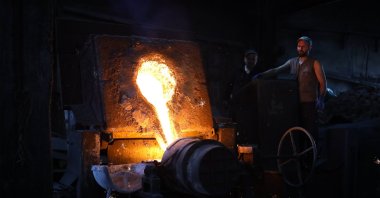 A worker is seen at a metal casting foundry, Gaziantep, southeastern Türkiye, March 18, 2026. (AA Photo)