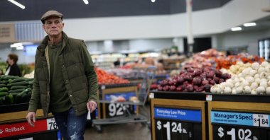 A customer looks over produce at a Walmart Supercenter retail store in North Bergen, New Jersey, U.S., Nov. 21, 2025. (Reuters Photo)