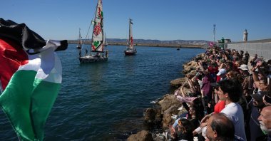 Residents wave Palestinian flags as about 20 boats depart from Marseille, France, to join the Global Sumud Flotilla’s "Spring 2026 Mission," chanting slogans such as "Long live the Palestinian struggle," "Gaza, Marseille stands with you" and "Freedom for Palestine," Marseille, France, April 4, 2026. (AA Photo)