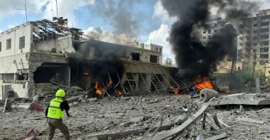 First responders rush to the site of an Israeli airstrike that targeted the Lebanese State Security Center, in the southern city of Nabatieh, Lebanon, April 10 2026. (AFP Photo)