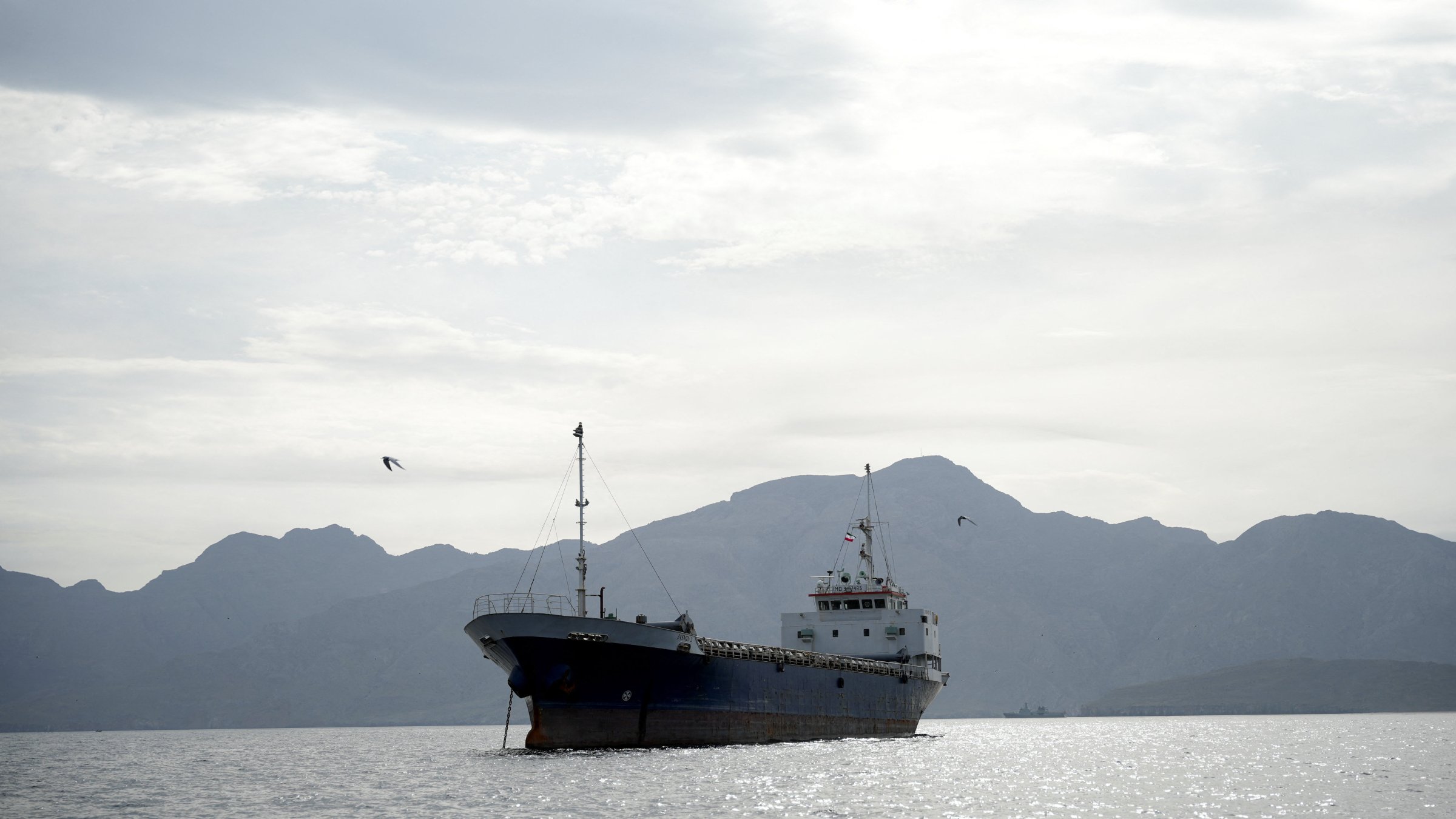 A vessel at the Strait of Hormuz, off the coast of Oman’s Musandam province, April 12, 2026. REUTERS