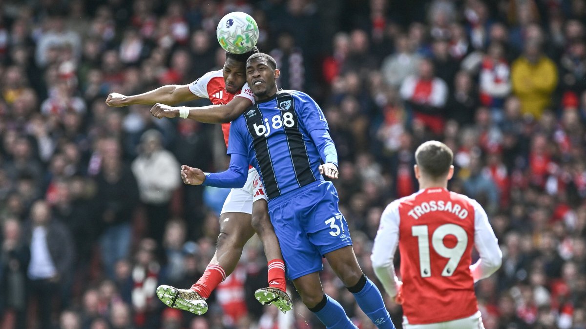 Arsenal's Myles Lewis-Skelly and Bournemouth's Rayan battle for the ball during a Premier League match in London, U.K, April 11, 2026. (EPA Photo)