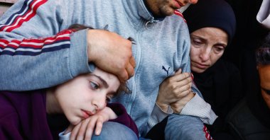 Mourners react as they attend the funeral of Al Jazeera journalist Mohammad Weshah, who was killed in an Israeli strike, in Deir al-Balah, central Gaza Strip, Palestine, April 9, 2026. (Reuters Photo)