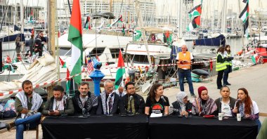 Global Sumud Flotilla  organizers including Türkiye's Sümeyra Akdeniz Ordu (3rd R) attend a news conference before the flotilla's departure, Barcelona, Spain, April 12, 2026. (Reuters Photo)