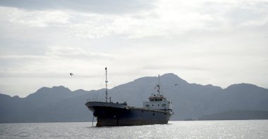 A vessel at the Strait of Hormuz, off the coast of Oman’s Musandam province, April 12, 2026. REUTERS