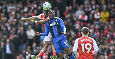 Arsenal's Myles Lewis-Skelly and Bournemouth's Rayan battle for the ball during a Premier League match in London, U.K, April 11, 2026. (EPA Photo)