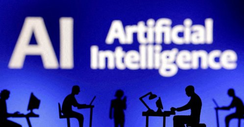 Figurines with computers and smartphones are seen in front of the words "Artificial Intelligence, AI" in this illustration created on Feb. 19, 2024. (Reuters Photo)