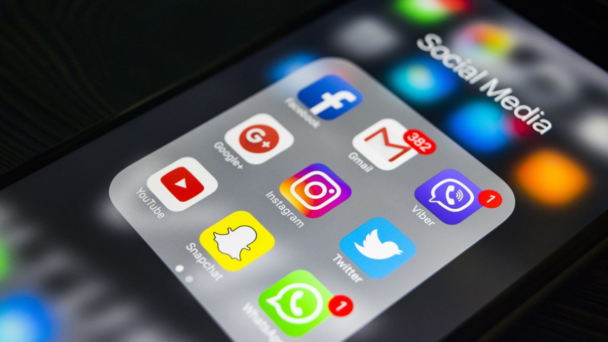 A screen displaying multiple social media platforms. (Shutterstock Photo) 