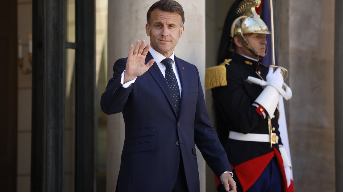 French President Emmanuel Macron gestures as he walks out of the Elysee Palace to welcome Ghana's president on his arrival, Paris, France, April 8, 2026.  (EPA Photo)