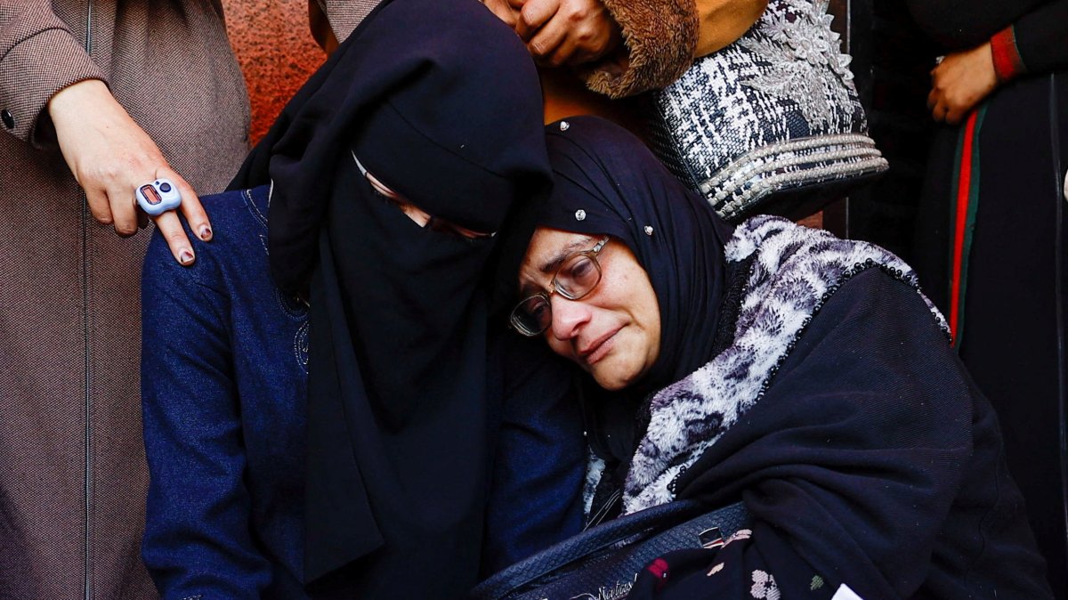 Mourners react during the funeral of Palestinians who were killed in an Israeli strike at Al-Aqsa Martyrs Hospital in Deir al-Balah, central Gaza Strip, Palestine, April 13, 2026. (Reuters Photo)
