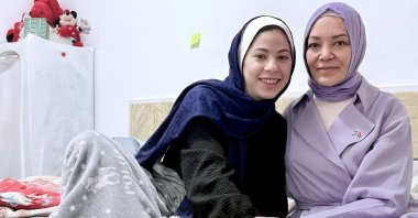 In this undated photo, Nur (L) and Daily Sabah Columnist Hilal Kaplan sit in Nur's room, Cairo, Egypt. (Courtesy of Hilal Kaplan)
