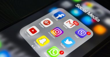 A screen displaying multiple social media platforms. (Shutterstock Photo) 