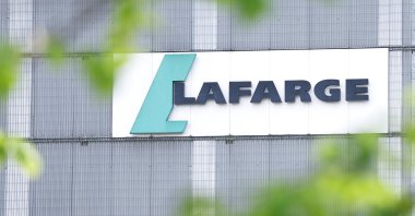 The logo of the French building materials maker, Lafarge, is displayed at its concrete production plant, Paris, France, April 10, 2026. (Reuters photo)