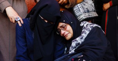 Mourners react during the funeral of Palestinians who were killed in an Israeli strike at Al-Aqsa Martyrs Hospital in Deir al-Balah, central Gaza Strip, Palestine, April 13, 2026. (Reuters Photo)