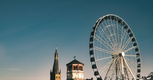 A ferris wheel on the Rhine River, Düsseldorf, Germany. (Shutterstock Photo)