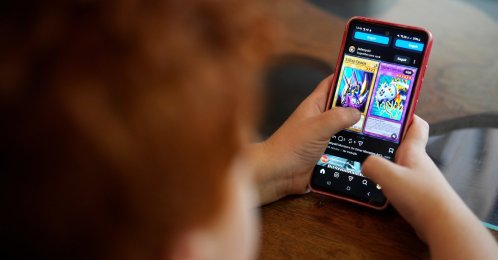A boy uses a social media platform in Brasilia, Brazil, March 19, 2026. (AP Photo)