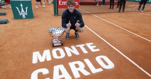 Italy's Jannik Sinner poses with his trophy after winning the ATP Monte-Carlo Masters final against Spain's Carlos Alcaraz, Roquebrune Cap Martin, France, April 12, 2026. (EPA Photo)