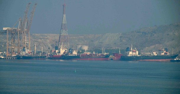 Tankers are seen at the Khor Fakkan Container Terminal, the only natural deep-sea port in the region and one of the major container ports in the Sharjah Emirate, along the Strait of Hormuz, a waterway through which one-fifth of global oil output passes, June 23, 2025. (AFP Photo)