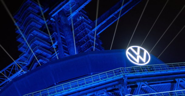 A logo of Volkswagen appears on the illuminated preserved blast furnace during the company’s event at Shougang park in Beijing, China, April 8, 2026. (Reuters Photo)