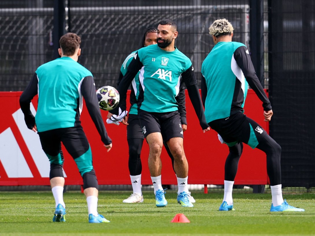 Liverpool's Mohamed Salah with Hugo Ekitike, Florian Wirtz and Rio Ngumoha attend a training session ahead of a UEFA Champions League match against PSG, Liverpool, U.K., April 13, 2026. (Reuters Photo)