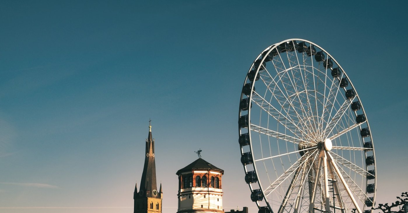 A ferris wheel on the Rhine River, Düsseldorf, Germany. (Shutterstock Photo)