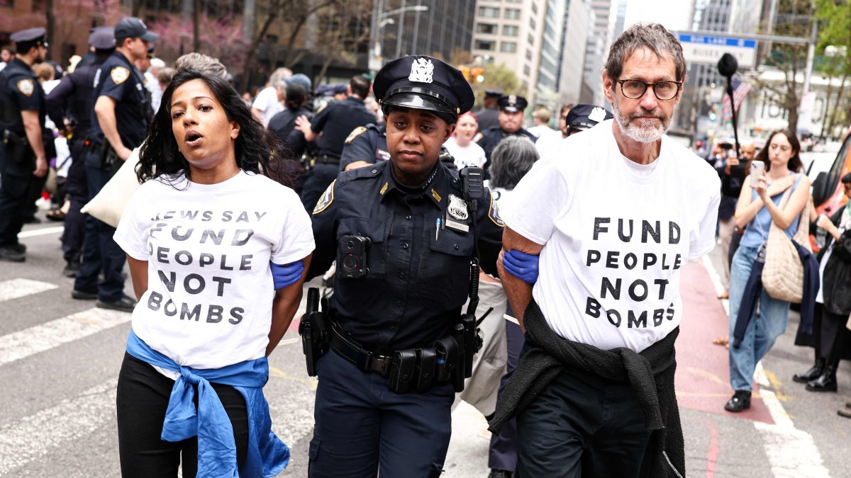 Protesters are arrested by police during a demonstration and sit-in on Third Avenue in New York City, U.S., April 13, 2026. (AFP Photo)