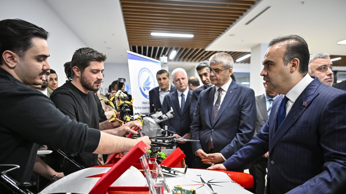 Industry and Technology Minister Mehmet Fatih Kacır (R) speaks with students at an event, Istanbul, Türkiye, April 13, 2026. (AA Photo)