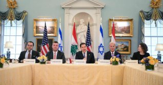 U.S. Secretary of State Marco Rubio, alongside U.S. State Department Counselor Michael Needham (2L) and U.S. Ambassador to Lebanon Michel Issa (2R), speaks during a meeting with Lebanon's Ambassador to the US Nada Hamadeh Moawad (out of frame) and Israeli Ambassador to the U.S. Yechiel Leiter (out of frame) at the State Department in Washington, D.C., April 14, 2026. (AFP Photo)