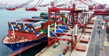 A cargo ship is moored at the port, Qingdao, China, April 14, 2026. (AFP Photo)