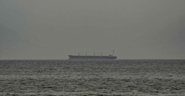 A ship is seen in the Persian Gulf off the coast of Sharjah, United Arab Emirates, April 13, 2026. (AFP Photo)