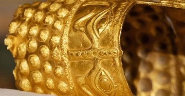 A close-up view of the recovered golden helmet of Cotofenesti during its presentation to the press at the Drents Museum, Assen, The Netherlands, April 2, 2026. (AFP Photo)