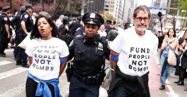 Protesters are arrested by police during a demonstration and sit-in on Third Avenue in New York City, U.S., April 13, 2026. (AFP Photo)