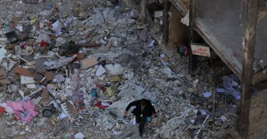 A member of the media works at the scene of residential buildings which were destroyed by U.S.-Israeli airstrikes at the Shahid Broujerdi residential complex in southern Tehran, Iran, April 14, 2026. (EPA Photo)