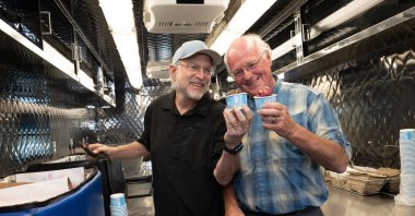 Jerry Greenfield and Ben Cohen, co-founders of Ben &amp; Jerry’s, hand out free ice cream at Franklin Square in Philadelphia, Sept. 16, 2024. (AFP File Photo)
