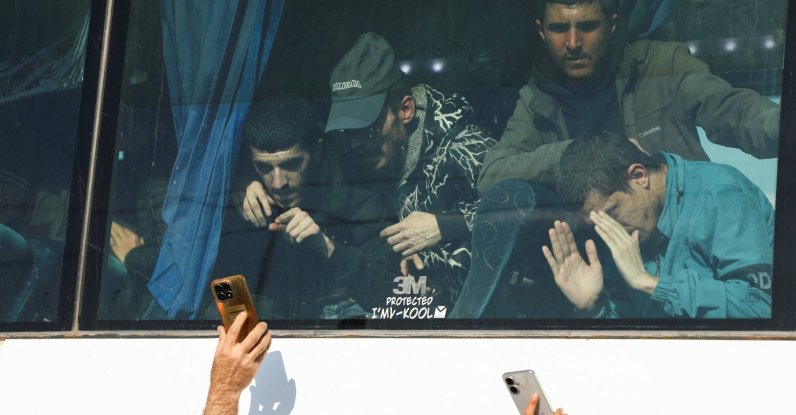 Former detainees held by the YPG look through a bus window as they arrive after being released under an agreement with the Syrian government, Hassakeh, Syria, April 11, 2026. (Reuters Photo)