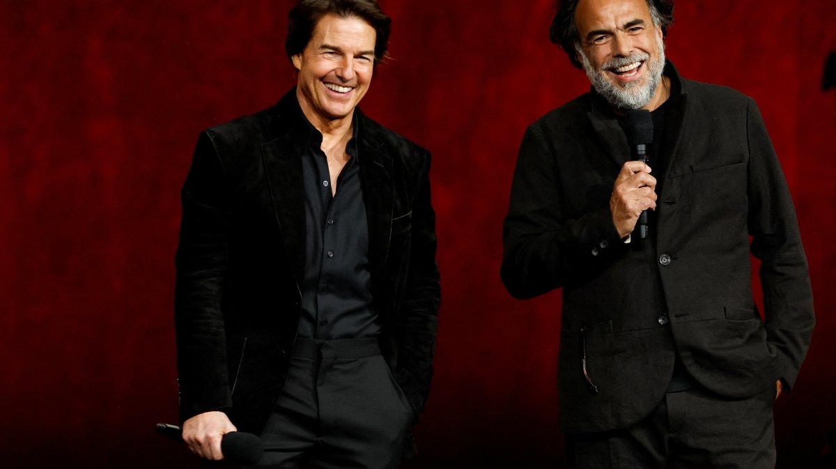 Cast member Tom Cruise and director Alejandro Gonzalez Inarritu of the upcoming film "Digger" speak during the Warner Bros. Pictures presentation at CinemaCon, Las Vegas, U.S., April 14, 2026. (Reuters Photo)