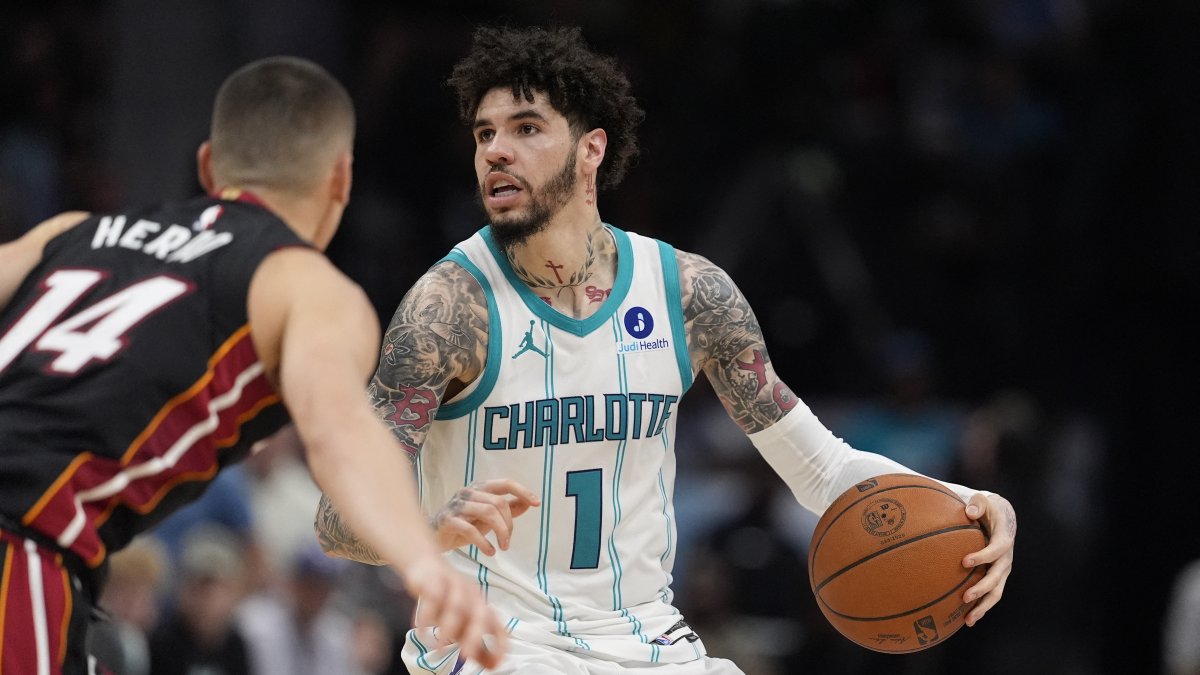 Hornets' guard LaMelo Ball is defended by Heat's guard Tyler Herro during an NBA play-in tournament match, Charlotte, North Carolina, U.S., April 14, 2026. (Reuters Photo)