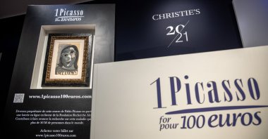 The commissioner's desk during the "1 Picasso for 100 euros" charity raffle draw to win Pablo Picasso’s work "Portrait of Dora Mar," Paris, France, April 14, 2026. (EPA Photo)