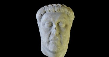 A marble head returned to Türkiye from the U.S. is displayed at the Izmir Archaeology Museum, Izmir, Türkiye, Aprıl 15, 2026. (AA Photo)