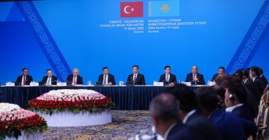 Vice President Cevdet Yılmaz and Kazakh Prime Minister Oljas Bektenov, alongside other officials, attend the roundtable meeting, Astana, Kazakhstan, April 15, 2026. (AA Photo)